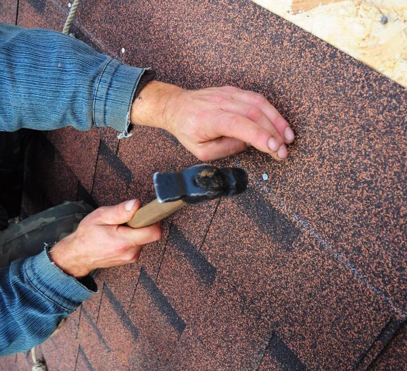 Roofer Install Asphalt Roof Shingles